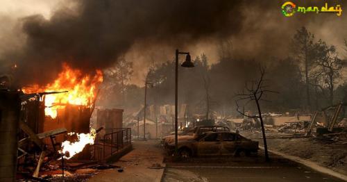 Thousands evacuate as California wildfires kill 10